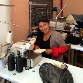 Elsa, working in her own sewing shop, producing pouches for Sacred Valley Salt