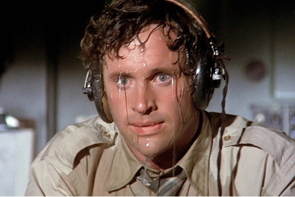 scene from the movie airplane in which the pilot is sweating profusely