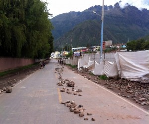 The only paved road through the sacred valley thoroughly blocked by debris