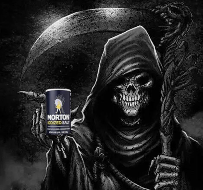 The grim reaper holding a scythe in one hand and a salt shaker in the other